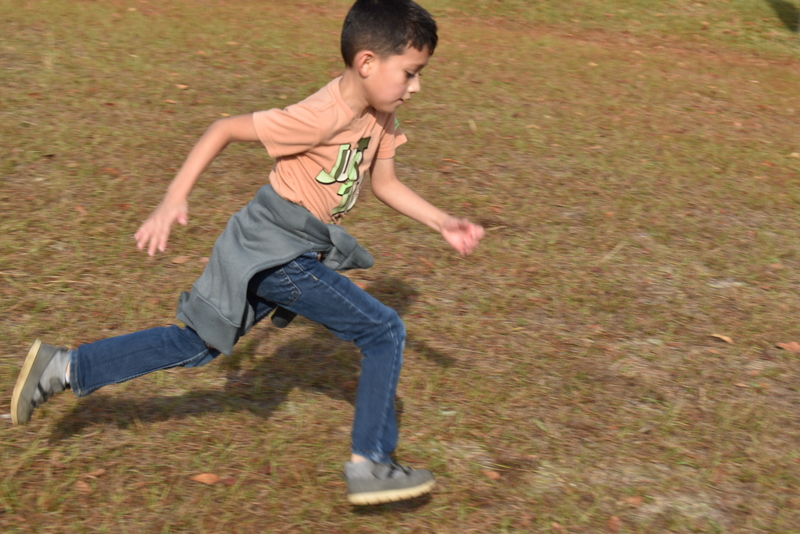 Students running and walking at the Turkey Trot.