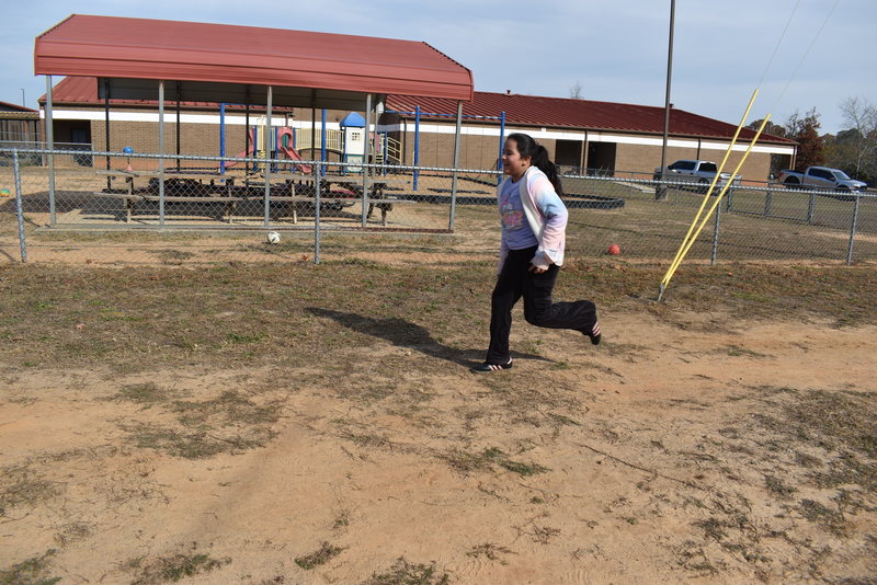 Students running and walking at the Turkey Trot.