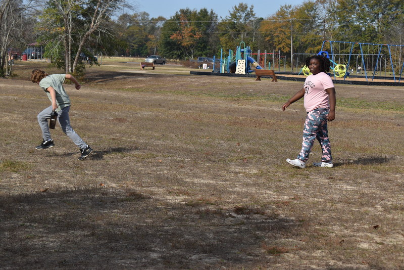 Students running and walking at the Turkey Trot.
