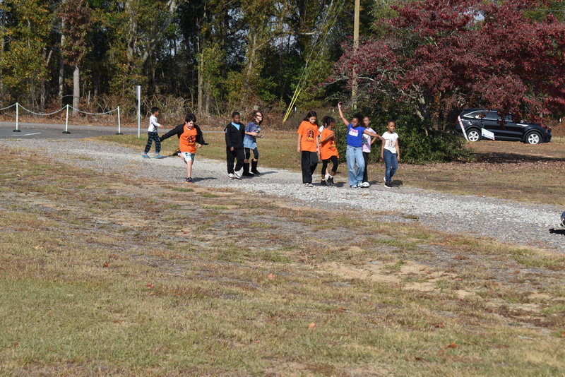 Students running and walking at the Turkey Trot.