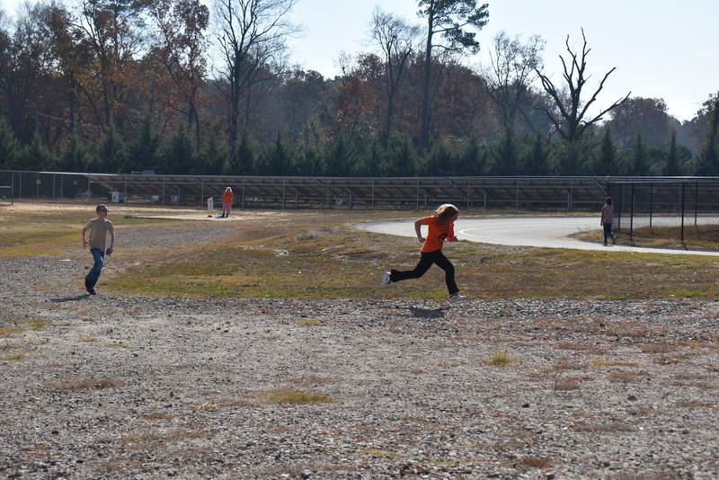 Students running and walking at the Turkey Trot.