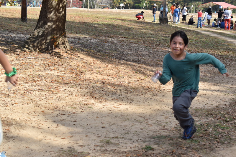 Students running and walking at the Turkey Trot.