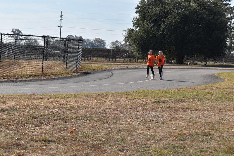 Students running and walking at the Turkey Trot.