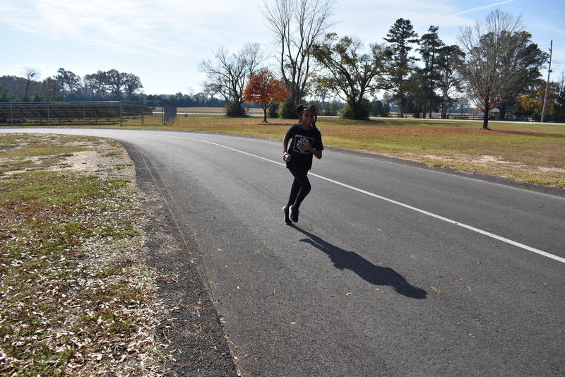 Students running and walking at the Turkey Trot.