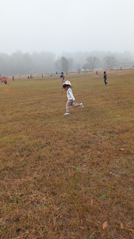 Students running and walking at the Turkey Trot.
