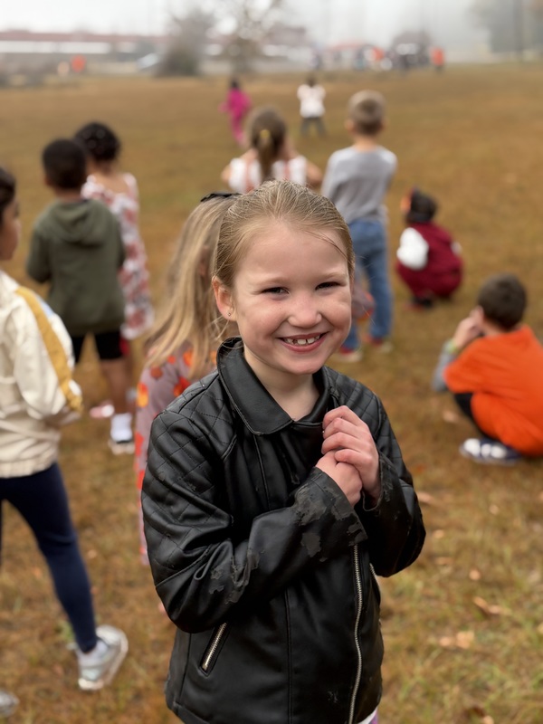 Students waiting at their Turkey Trot station.