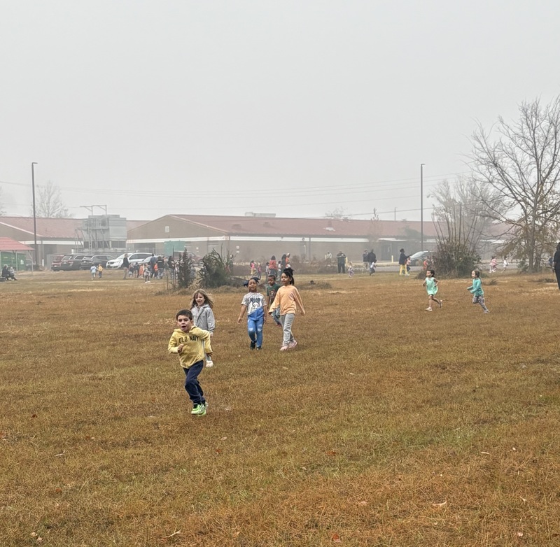 Students running and walking at the Turkey Trot.