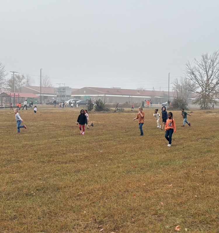 Students running and walking at the Turkey Trot.