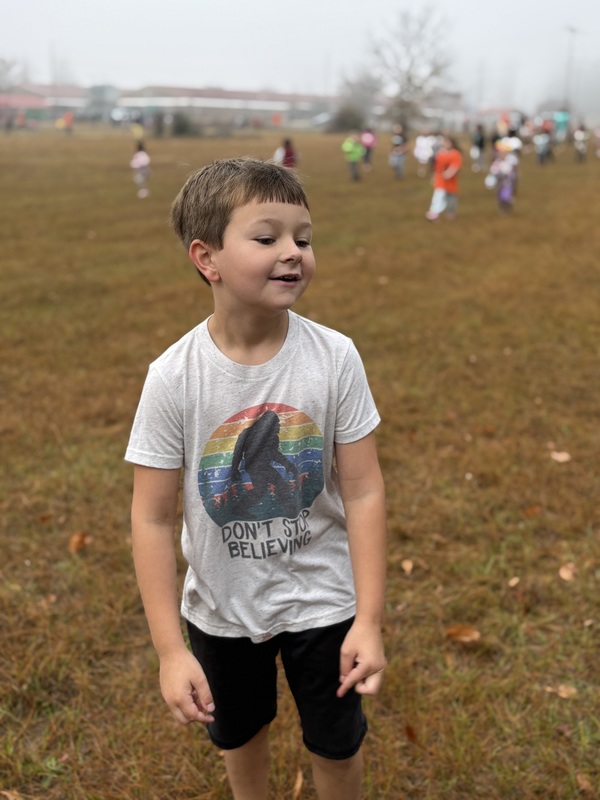 Student waiting at end of Turkey Trot.