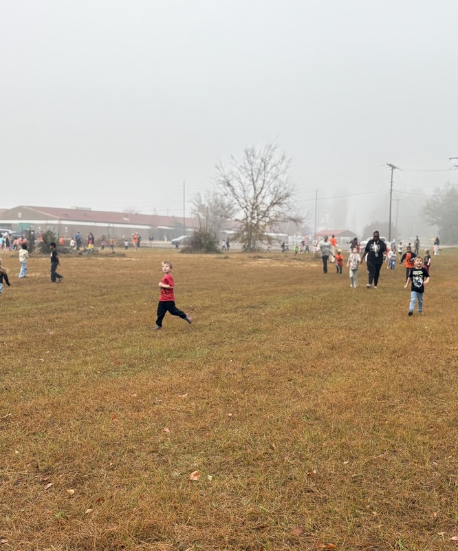 Students running and walking at the Turkey Trot.