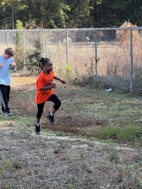 Students running and walking at the Turkey Trot.