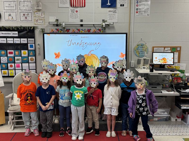 Class wearing turkey masks.