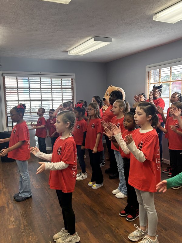 Spirit team performing at daycare.