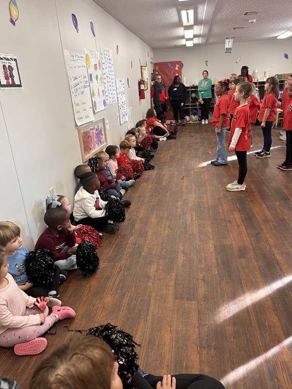Spirit team performing at daycare.