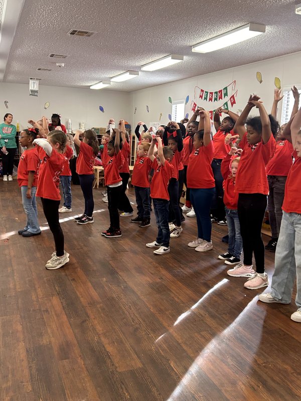 Spirit team performing at daycare.