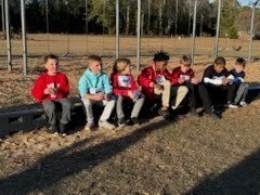 Runners watiing for awards.