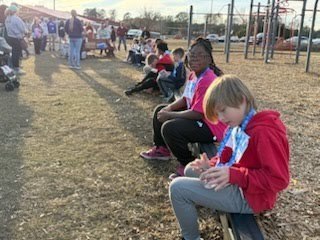 Runners watiing for awards.