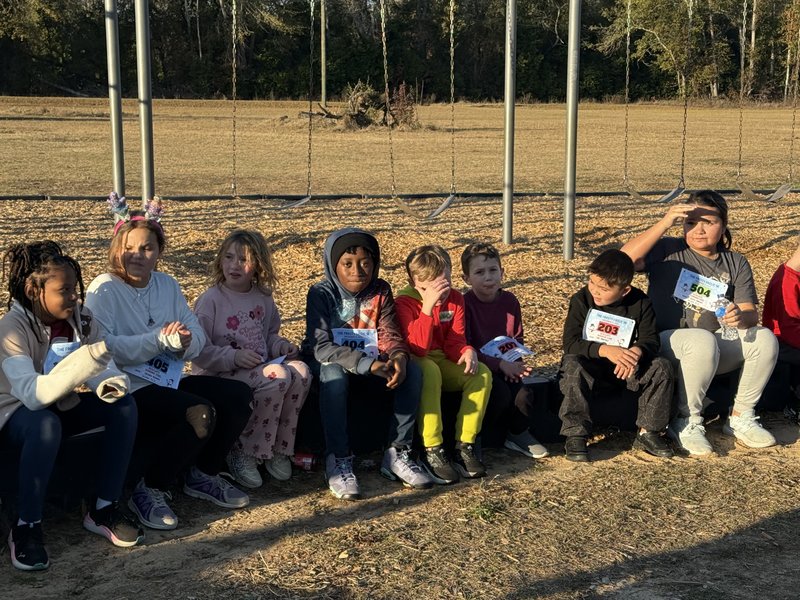 Runners at end of race.