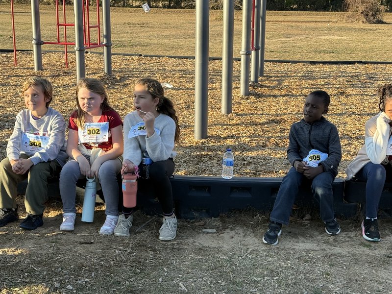 Runners at end of race.