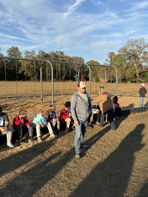 Runners at end of race.