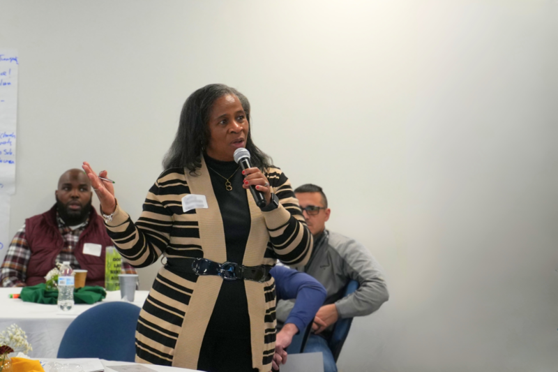 Participator speaking after group discusion.