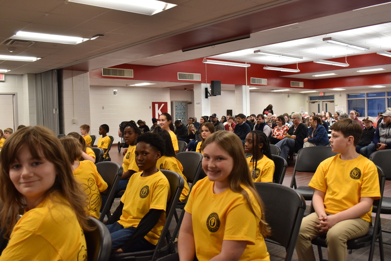 Students sitting in audience.