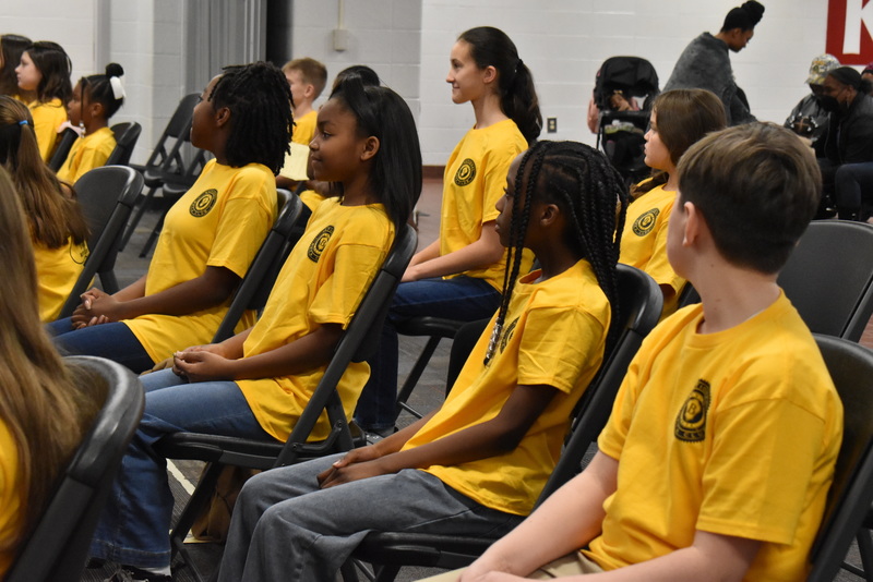Students sitting in audience.