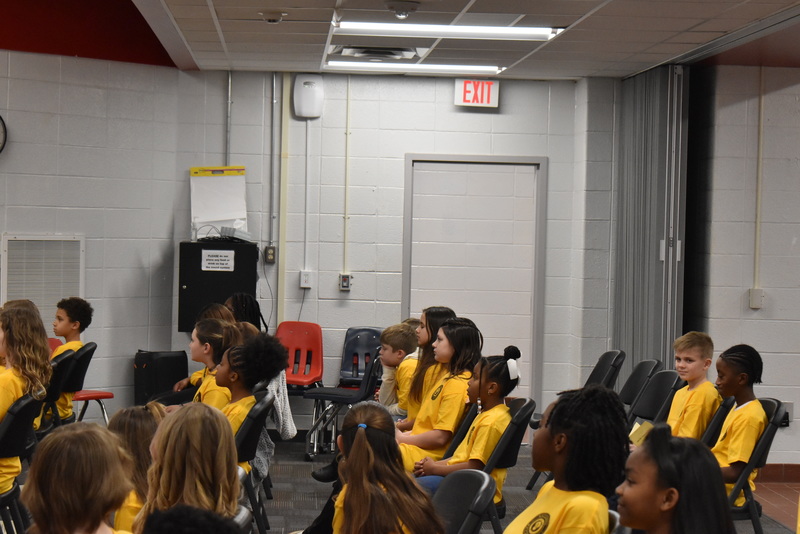 Students sitting in audience.