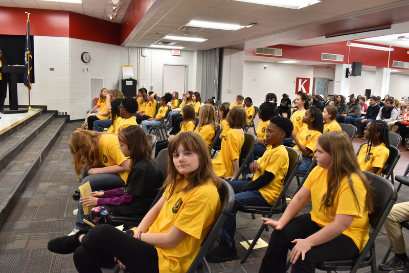 Students sitting in audience.