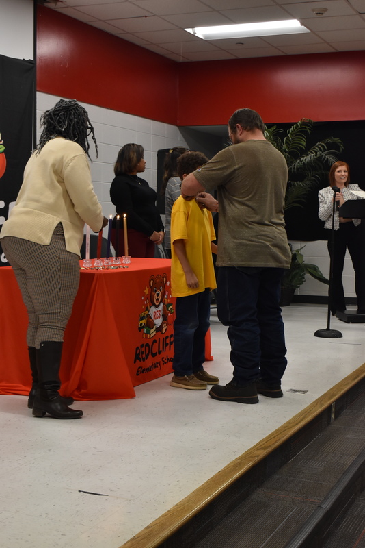 Stuent being pinned by guardian.