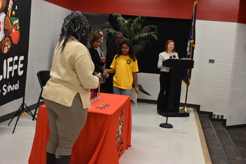 Student waiting to be pinned.