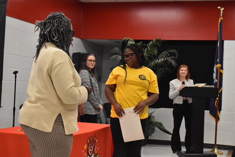 Student waiting to be pinned.