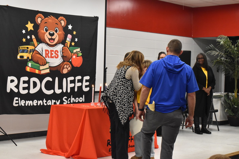 Student being pinned by family