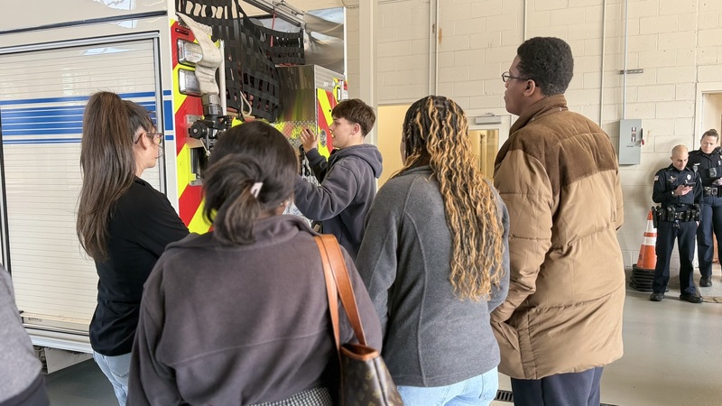 Students observing fireman instructor.