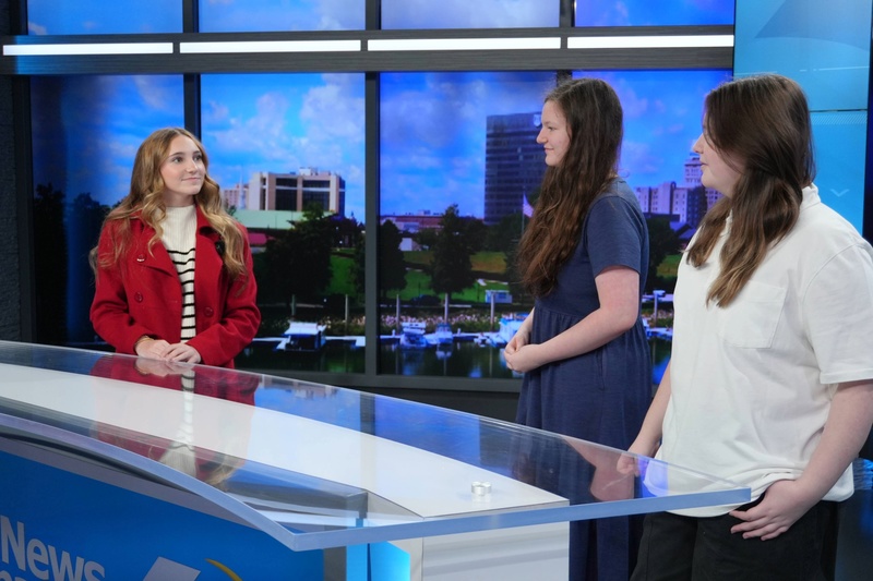 Student interviewing other students at WJBF.