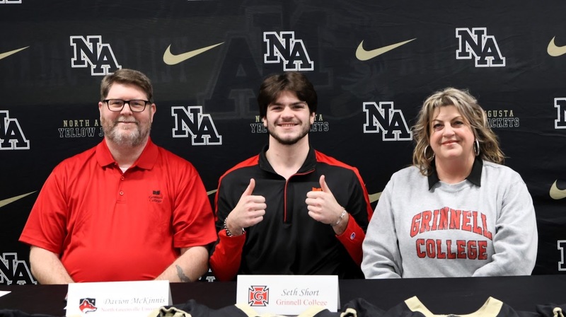 Football player with family.