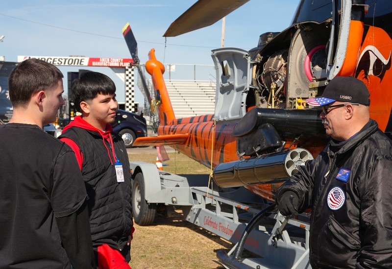 Representative from the USMC speaks to students.