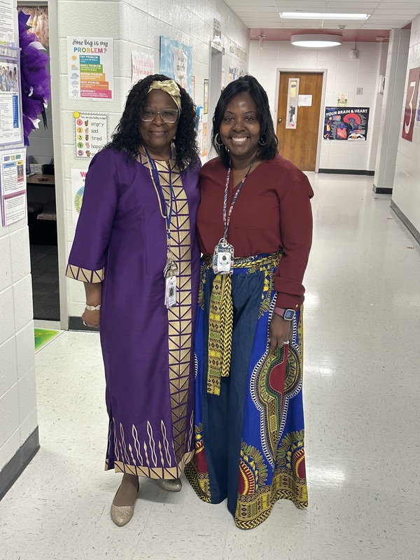 Staff dressed in cultural attire.