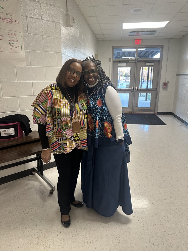 Staff dressed in cultural attire.