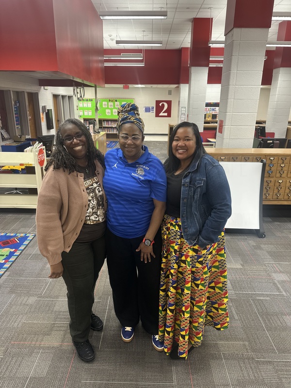 Staff dressed in cultural attire.