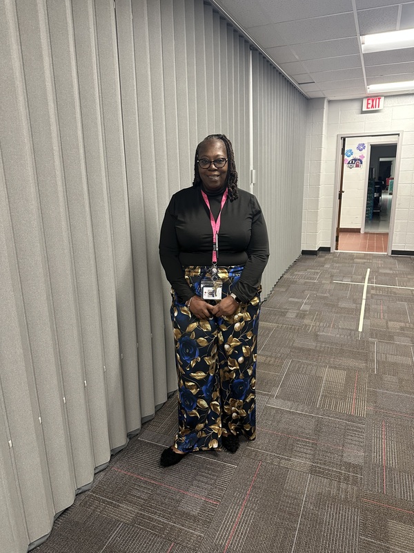 Staff dressed in cultural attire.