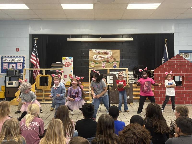 Students performing in the play.