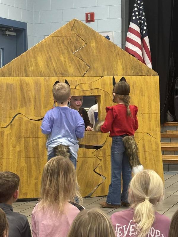 Two students dressed as wolves for the play.