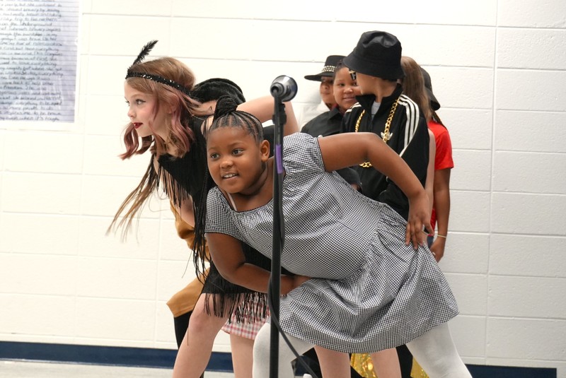 North Augusta Elementary School students perform in a fashion show through the decades.