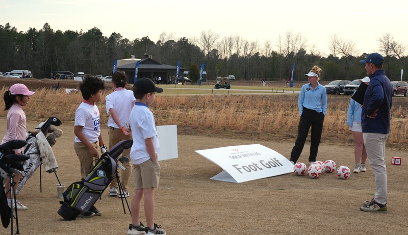 Foot golf drill instructors speak to students.
