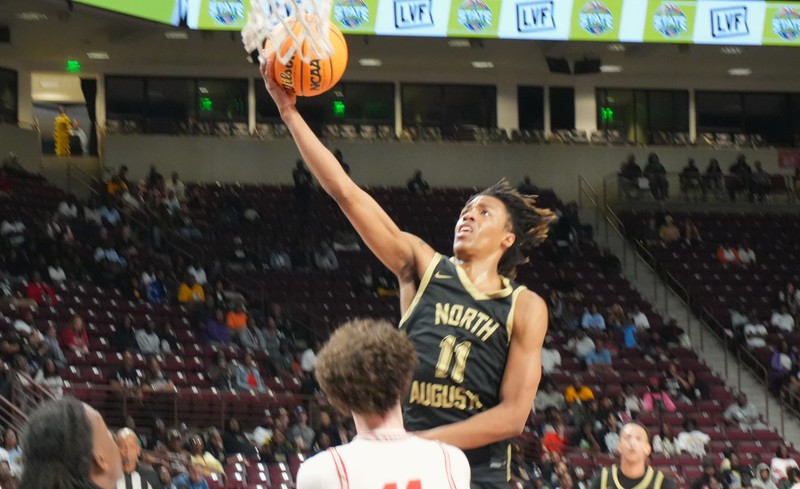 North Augusta basketball player reaches for layup.