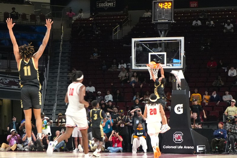 North Augusta dunks a ball.