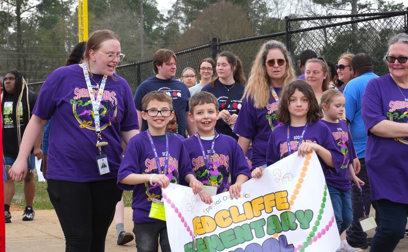 Redcliffe Elementary students hold a banner in the opening ceremonies parade.