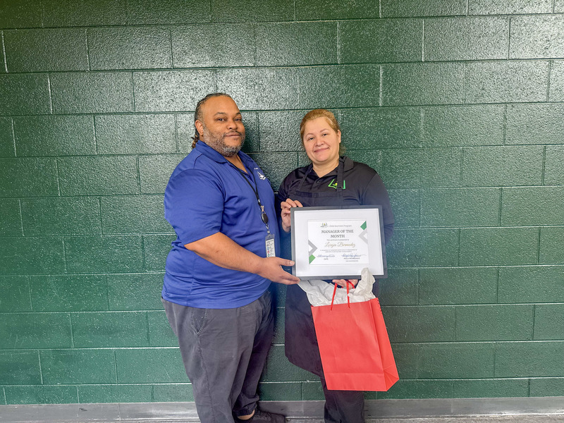 Child Nutrition Manager Lorgia Bermudez posing for a photo with Child Nutrition Field Supervisor Asa Pontoo