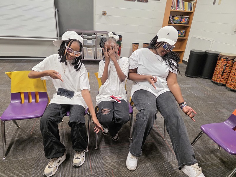 Students sitting in chairs.